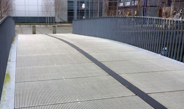 GRP pedestrian bridge at Copenhagen University provides durable and slip-resistant access.